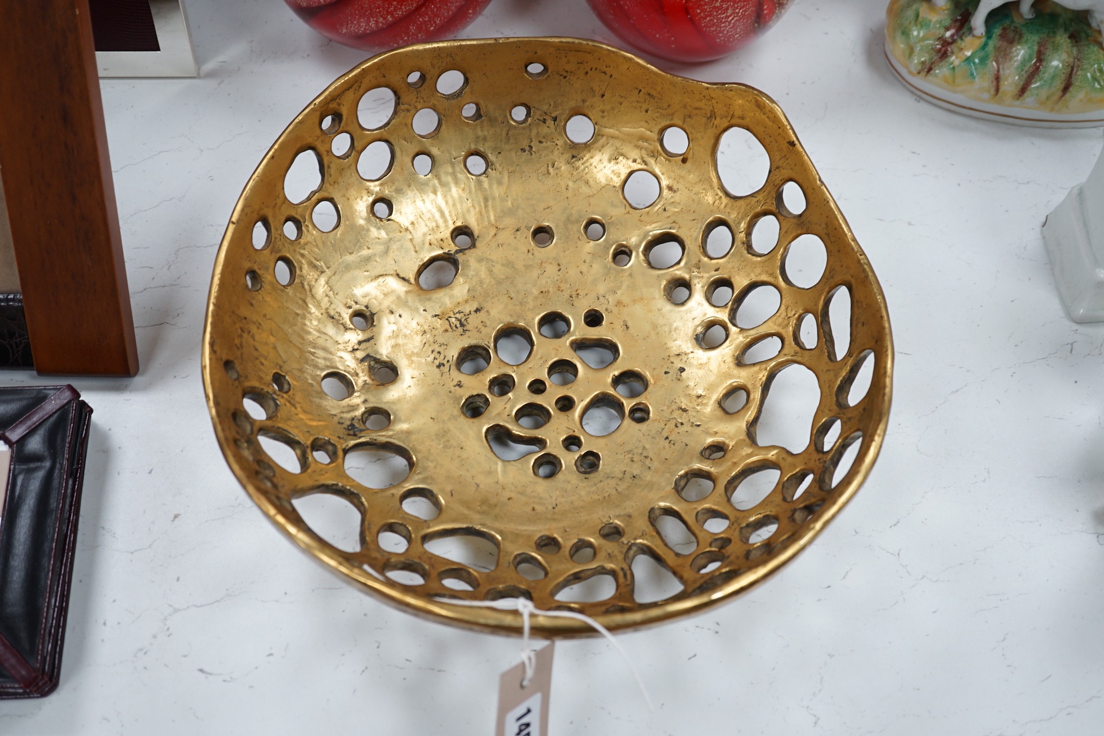 A pair of globular coloured glass ornaments and an art-bronze bowl, 33cm diameter